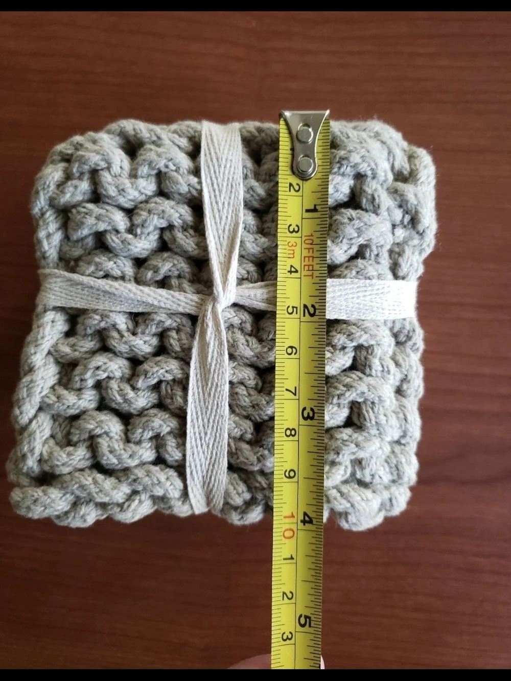 4 grey chunky crocheted coasters. NEW